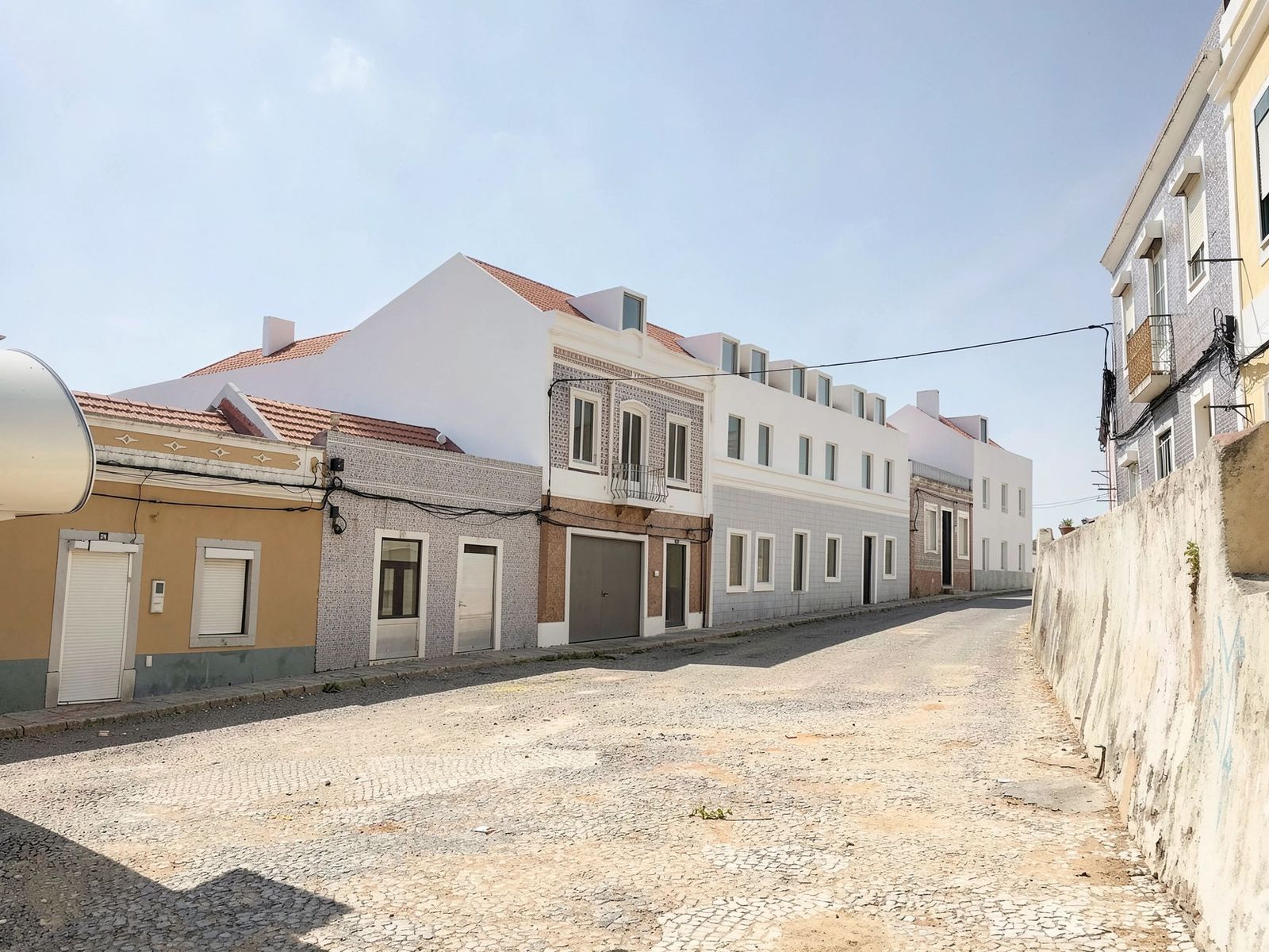 Rua do Castelo: the new white façades set between the street's tiled houses, 3D render